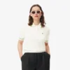 Damen-Poloshirt aus nahtloser 3D-Stretch-Baumwolle in verkürzter Passform