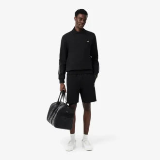 Fleece-Shorts mit Logo-Streifen in regulärer Passform
