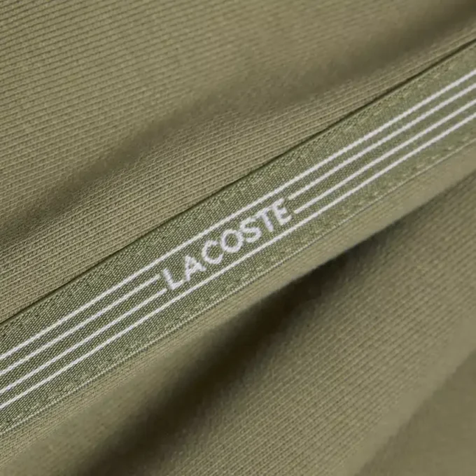 Fleece-Shorts mit Logo-Streifen in regulärer Passform