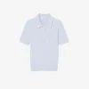 Gestreifter Pullover mit Zopfmuster und Poloshirt-Kragen
