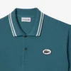 Herren-Poloshirt L.12.12 mit Badge in klassischer Passform