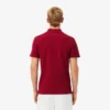 Herren-Poloshirt „L.12.12“ mit Logo-Einfassung in Regular Fit