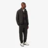 Herren-Poloshirt mit gestreiftem Muster und lockerer Passform