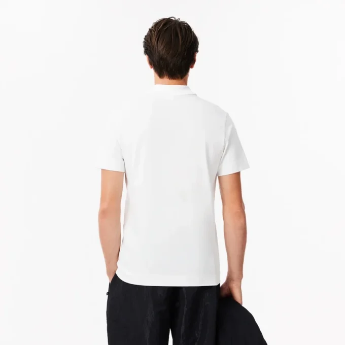 Herren-Poloshirt mit Regular Fit und „Lacoste Movement“-Print