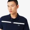 Herren-Tennis-Heritage-Poloshirt mit Ultra Dry-Emblem