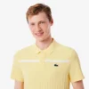 Herren-Tennis-Heritage-Poloshirt mit Ultra Dry-Emblem