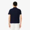 Herren-Tennis-Heritage-Poloshirt mit Ultra Dry-Emblem
