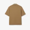 Oversized-Satin-Poloshirt mit Runway-Badge-Akzent