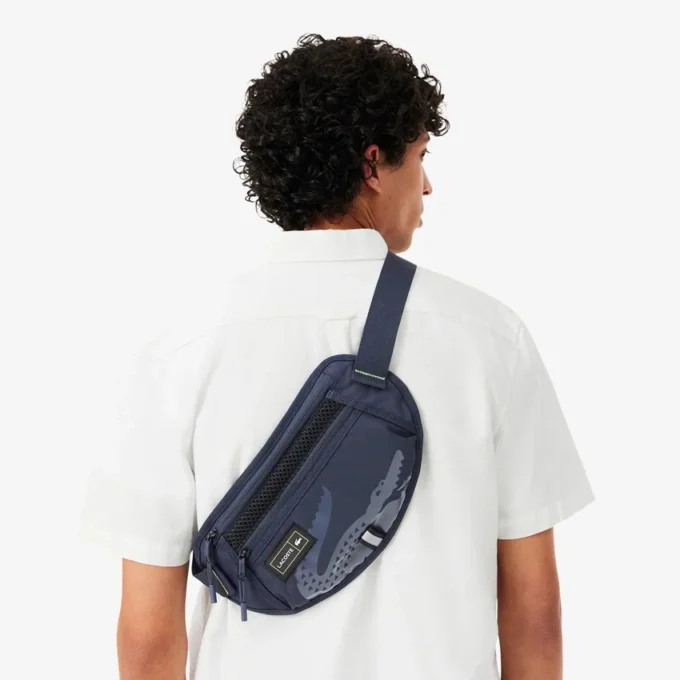 Play in Lacoste-Gürtel-Tasche