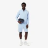 Play in Lacoste Reporter-Tasche