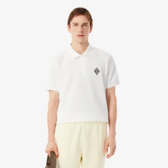 Polohemd mit klassischer Passform und Emblem-Akzent