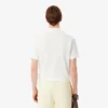 Polohemd mit klassischer Passform und Emblem-Akzent