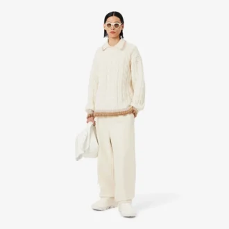 Runway-Pullover aus Wolle mit Poloshirt-Kragen und Zopfmuster