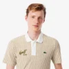 Thermoregulierendes gestreiftes Golf-Poloshirt für Herren