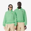 Unisex-Sweatshirt mit halbem Reißverschluss, lockerer Passform und Emblem-Akzent