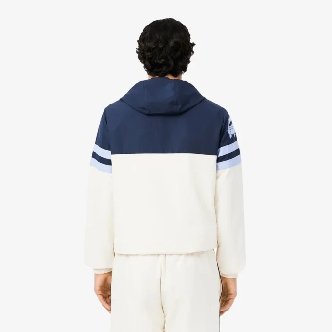 Wasserabweisende Herren-Tennisjacke mit Kapuze