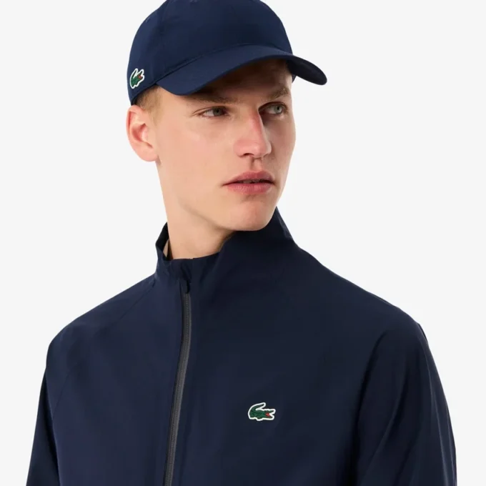 Wasserabweisende Stretch-Windjacke für Herren beim Golf