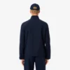 Wasserabweisende Stretch-Windjacke für Herren beim Golf