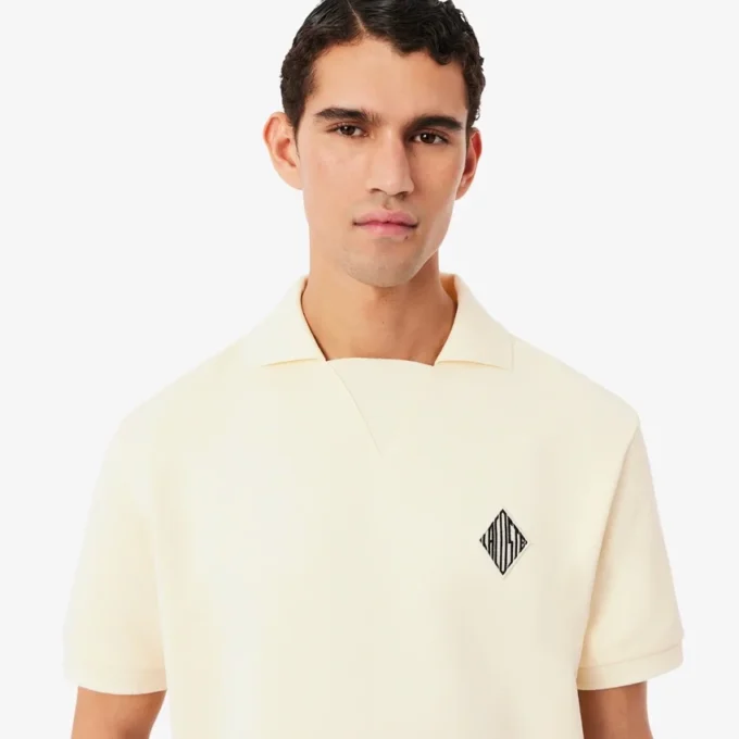 Weit geschnittenes Fleece-Poloshirt mit Emblem